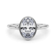 Vintage-Inspired Solitaire Oval Bezel Set Oval Diamond Engagement Ring in 10K/14K gold and platinum with certified lab-grown or natural diamonds