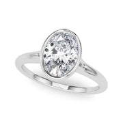 Vintage-Inspired Solitaire Oval Bezel Set Oval Diamond Engagement Ring in 10K/14K gold and platinum with certified lab-grown or natural diamonds