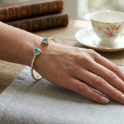 Trillion Cut Blue Topaz Open Cuff Bangle with Natural Halo Diamond in 10K/14K gold and platinum with certified lab-grown or natural diamonds