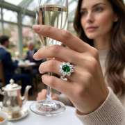 Emerald Halo Ring with Oval Cut Emerald and Diamond Cluster in 10K/14K gold and platinum with certified lab-grown or natural diamonds