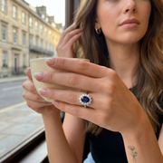 Oval Blue Sapphire Halo Engagement Ring in 10K/14K gold and platinum with certified lab-grown or natural diamonds