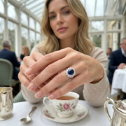 Oval Cut Blue Sapphire Halo Ring with Round Cluster Diamond in 10K/14K gold and platinum with certified lab-grown or natural diamonds