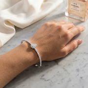Lab Grown Pear Cut Halo Diamond with Round Accent Bangle with Box Lock in 10K/14K gold and platinum with certified lab-grown or natural diamonds