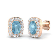 Cushion Cut Aquamarine Halo Stud Earrings in 10K/14K gold and platinum with certified lab-grown or natural diamonds