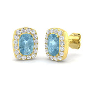 Cushion Cut Aquamarine Halo Stud Earrings in 10K/14K gold and platinum with certified lab-grown or natural diamonds