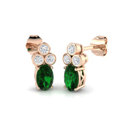 Oval Cut Emerald Diamond Earrings in 10K/14K gold and platinum with certified lab-grown or natural diamonds