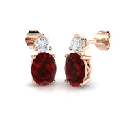 Oval Ruby Diamond Stud Earrings with Diamond Accent in 10K/14K gold and platinum with certified lab-grown or natural diamonds