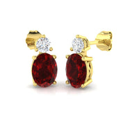 Oval Ruby Diamond Stud Earrings with Diamond Accent in 10K/14K gold and platinum with certified lab-grown or natural diamonds