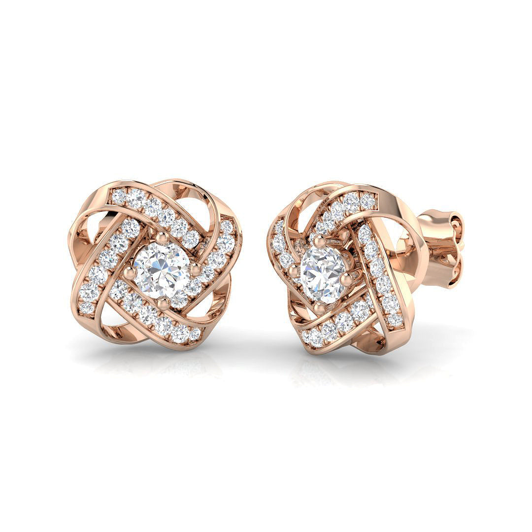 Gorgeous 0.50Ct Diamond Love Knot Stud Earrings in in 10K/14K gold and platinum with certified lab-grown or natural diamonds
