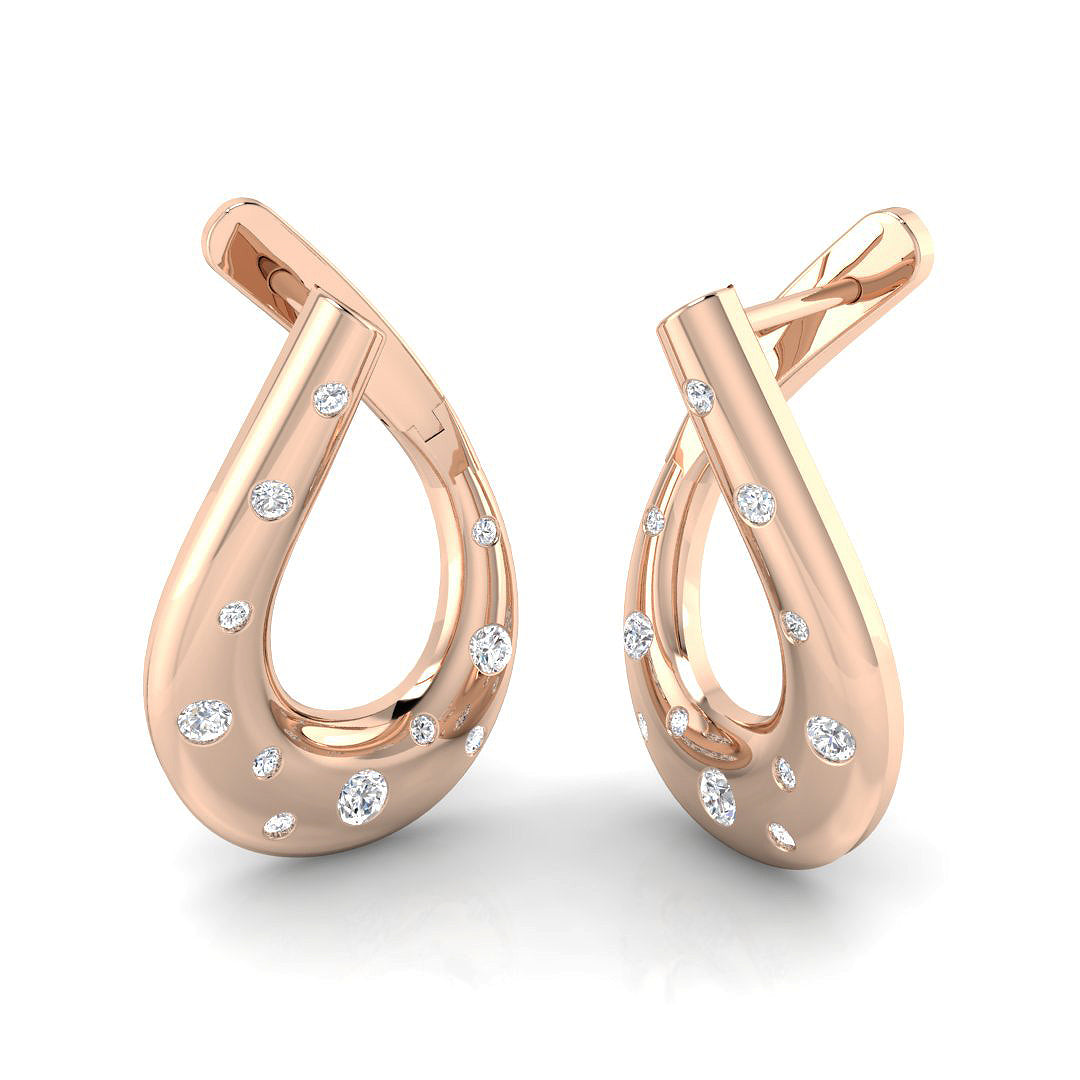 Elegant 0.33Ct Scattered Diamond Teardrop Twist Hoop Earrings in 10K/14K gold and platinum with certified lab-grown or natural diamonds