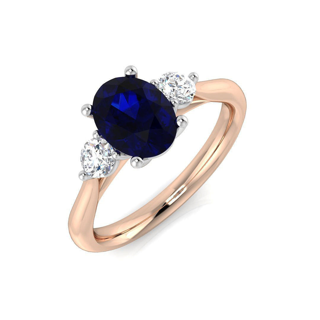 Oval Cut Blue Sapphire Trilogy Ring with Round Diamonds Side Stones in 10K/14K gold and platinum with certified lab-grown or natural diamonds