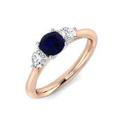 Blue Sapphire Three Stone Ring with Round Cut Side Stones in 10K/14K gold and platinum with certified lab-grown or natural diamonds