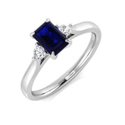 Emerald Cut Blue Sapphire Ring with Diamond Side Stones Trilogy Design in 10K/14K gold and platinum with certified lab-grown or natural diamonds