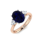 Oval Cut Blue Sapphire Ring with Round Side Stone Ring in 10K/14K gold and platinum with certified lab-grown or natural diamonds