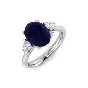 Oval Cut Blue Sapphire Ring with Round Side Stone Ring in 10K/14K gold and platinum with certified lab-grown or natural diamonds