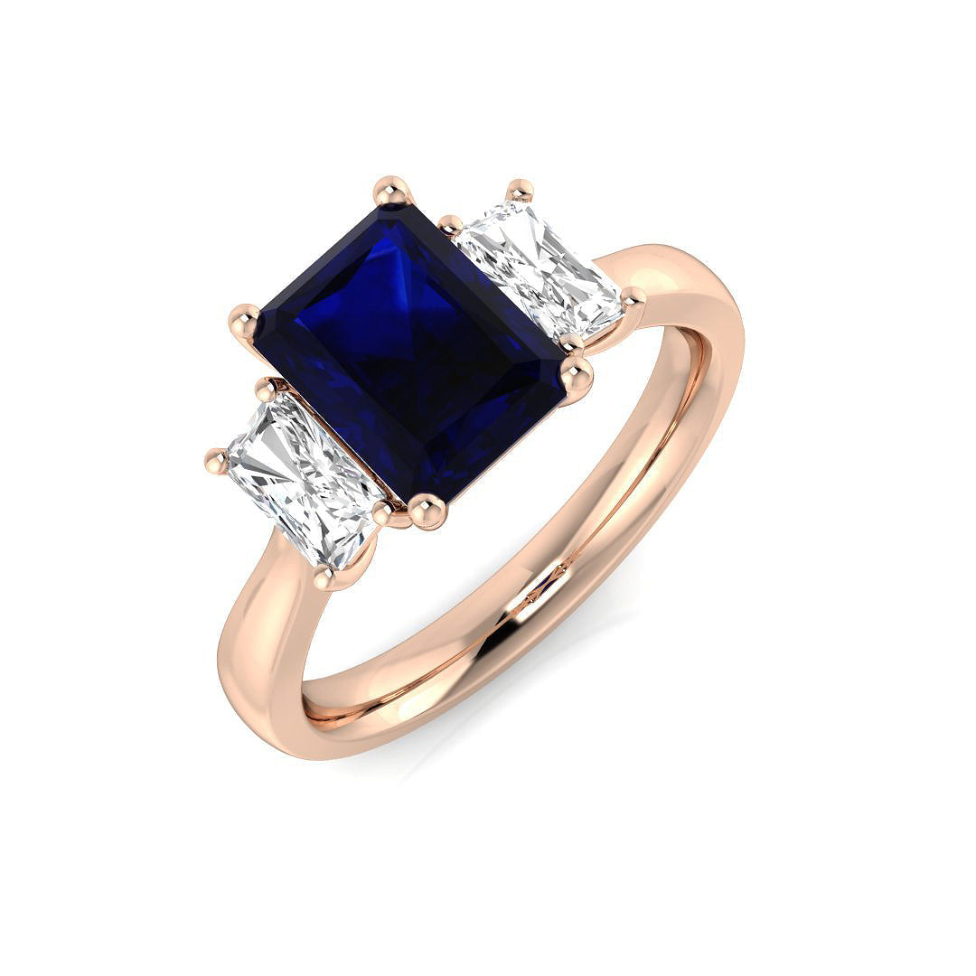 Emerald Cut Blue Sapphire & Baguette Diamond Three Stone Ring in 10K/14K gold and platinum with certified lab-grown or natural diamonds