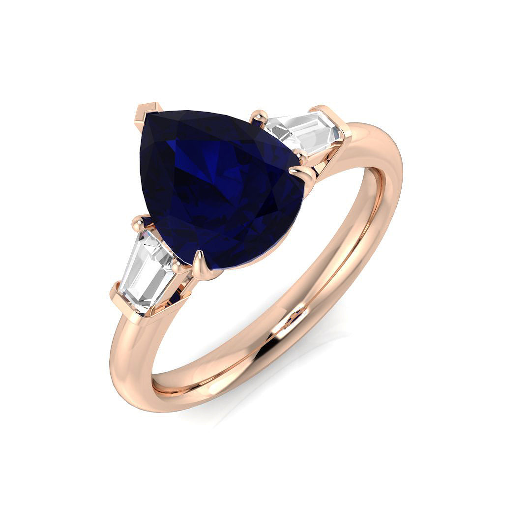 Pear Cut Blue Sapphire Three Stone Ring with Natural Baguette Side Stones in 10K/14K gold and platinum with certified lab-grown or natural diamonds