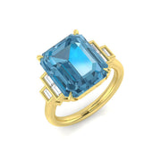 Emerald Cut Blue Topaz Solitaire Ring with Side Baguette Diamonds in 10K/14K gold and platinum with certified lab-grown or natural diamonds