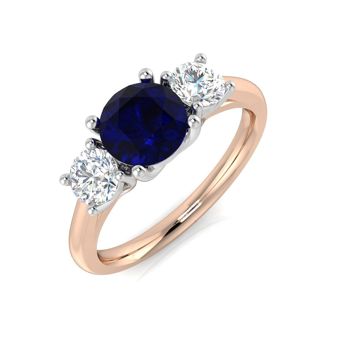 Round Blue Sapphire Three Stone Ring in 10K/14K gold and platinum with certified lab-grown or natural diamonds