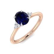 Blue Sapphire Solitaire Ring with Round Side Stones in 10K/14K gold and platinum with certified lab-grown or natural diamonds