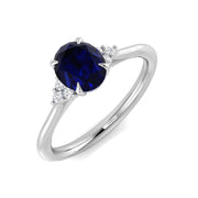 Blue Sapphire Solitaire Ring with Round Side Stones in 10K/14K gold and platinum with certified lab-grown or natural diamonds