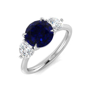 Round Sapphire Three Stone Engagement Ring in 10K/14K gold and platinum with certified lab-grown or natural diamonds
