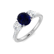 Blue Sapphire Three Stone Ring in 10K/14K gold and platinum with certified lab-grown or natural diamonds
