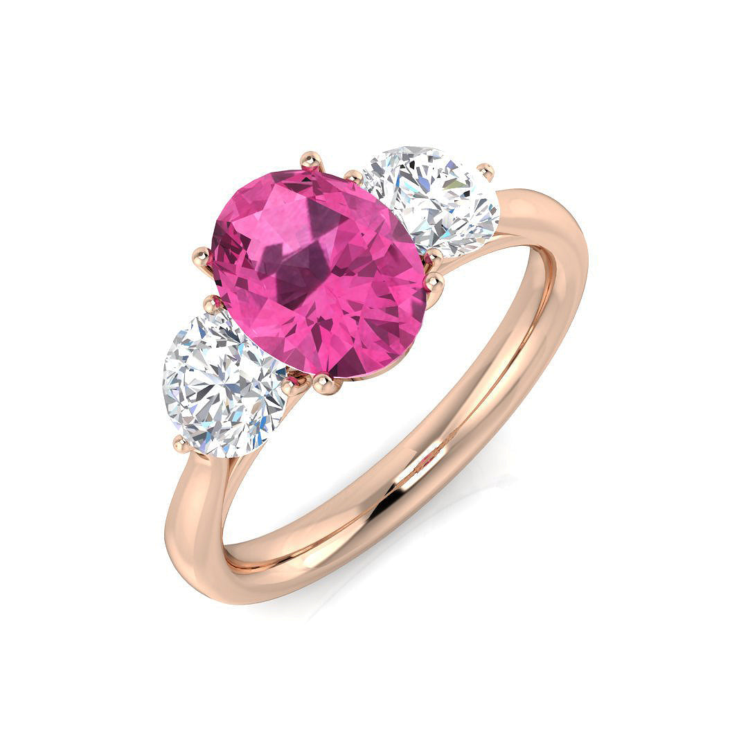 Oval Cut Pink Sapphire Ring with Diamond Side Stones in 10K/14K gold and platinum with certified lab-grown or natural diamonds