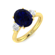 Oval Cut Blue Sapphire Side Stone Ring with Natural Round Side Stones in 10K/14K gold and platinum with certified lab-grown or natural diamonds
