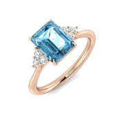 Sky Blue Topaz Solitaire Ring with Diamond Side Accents in 10K/14K gold and platinum with certified lab-grown or natural diamonds