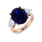 Blue Sapphire Three Stone Ring with Oval Sapphire & Round Diamonds in 10K/14K gold and platinum with certified lab-grown or natural diamonds