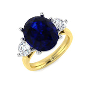 Blue Sapphire Three Stone Ring with Oval Sapphire & Round Diamonds in 10K/14K gold and platinum with certified lab-grown or natural diamonds