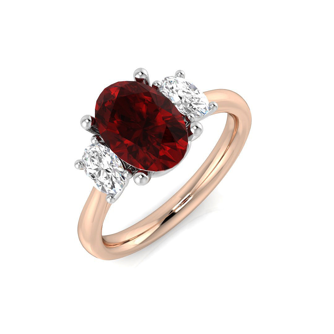 Ruby Three Stone Ring Oval Cut with Diamond Side Stones in 10K/14K gold and platinum with certified lab-grown or natural diamonds