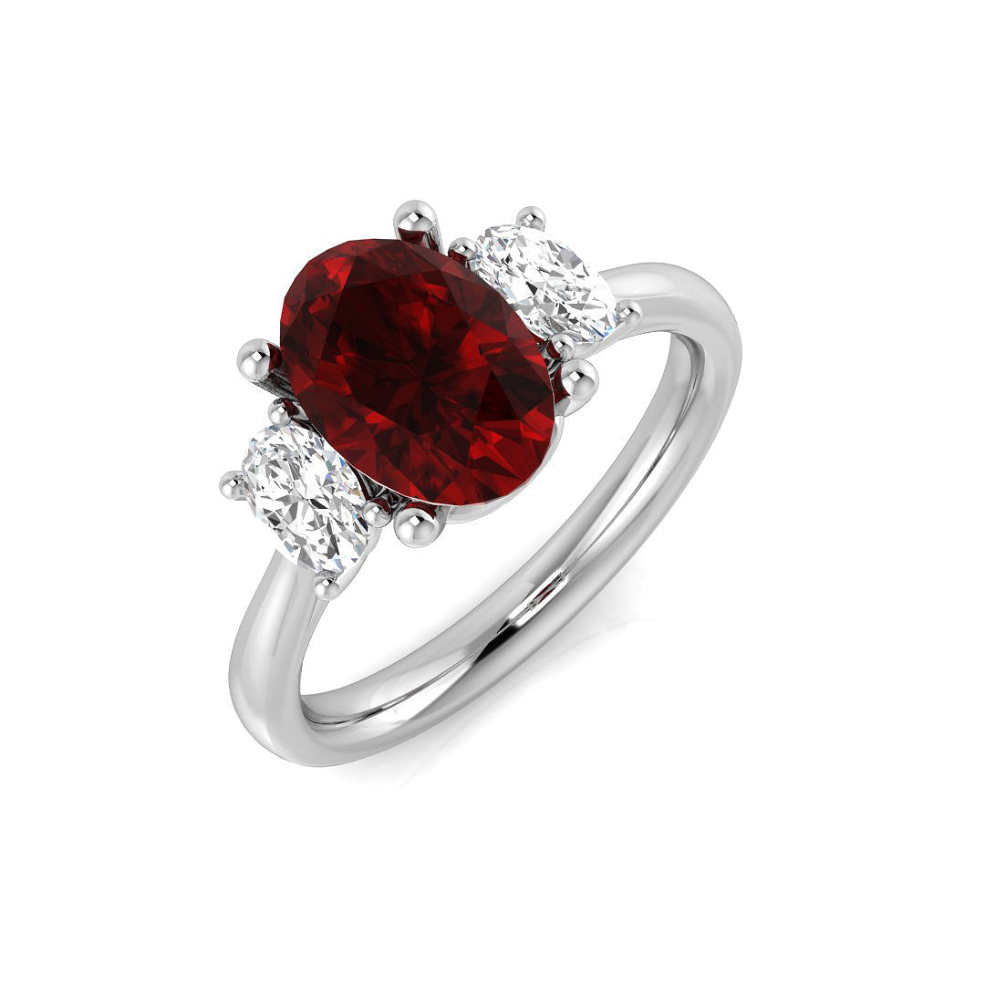 Ruby Three Stone Ring Oval Cut with Diamond Side Stones in 10K/14K gold and platinum with certified lab-grown or natural diamonds