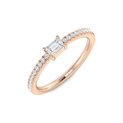 Baguette Diamond Solitaire Ring with Round Side Stones in 10K/14K gold and platinum with certified lab-grown or natural diamonds