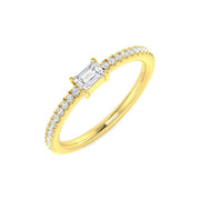 Baguette Diamond Solitaire Ring with Round Side Stones in 10K/14K gold and platinum with certified lab-grown or natural diamonds