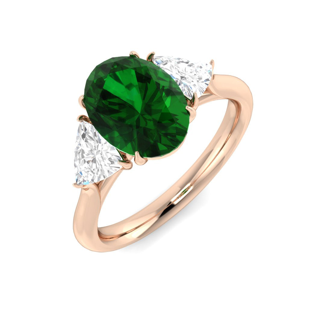 Oval Cut Emerald & Trillion Cut Side Diamond Design Ring in 10K/14K gold and platinum with certified lab-grown or natural diamonds