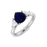 Pear Cut Blue Sapphire Ring with Trillion Cut Side Stone Trilogy Ring in 10K/14K gold and platinum with certified lab-grown or natural diamonds