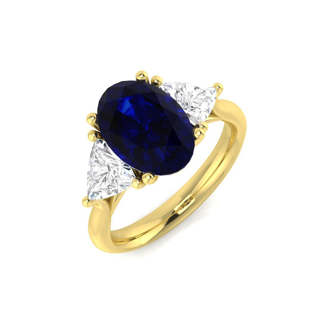 Oval Sapphire Three Stone Ring with Trillion Side Stone Diamonds in 10K/14K gold and platinum with certified lab-grown or natural diamonds