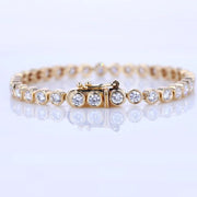 Bezel Set Diamond Tennis Bracelet in 10K/14K gold and platinum with certified lab-grown or natural diamonds