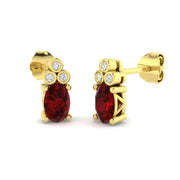 Oval Ruby with Natural Round Diamond Studs in 10K/14K gold and platinum with certified lab-grown or natural diamonds