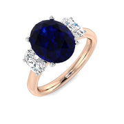 Natural Oval Cut Blue Sapphire with Side Stone Ring in Prong Set in 10K/14K gold and platinum with certified lab-grown or natural diamonds