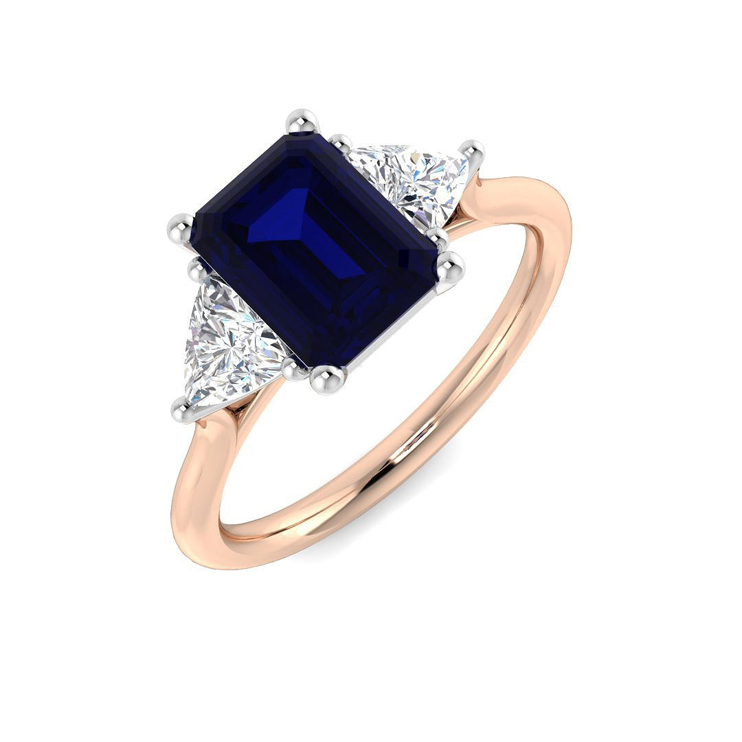Emerald Cut Blue Sapphire Ring with Trillion Diamond Side Stones in 10K/14K gold and platinum with certified lab-grown or natural diamonds