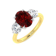 Ruby Three Stone Ring with Oval Cut & Diamond Side Stones in 10K/14K gold and platinum with certified lab-grown or natural diamonds