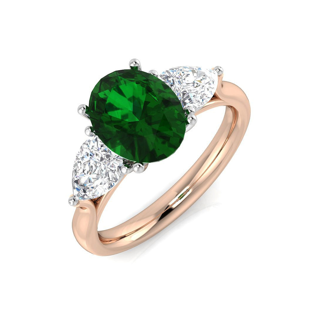 Oval Cut Emerald Ring with Pear Diamond Side Stones in 10K/14K gold and platinum with certified lab-grown or natural diamonds