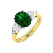 Oval Cut Emerald Ring with Pear Diamond Side Stones in 10K/14K gold and platinum with certified lab-grown or natural diamonds