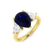 Pear Cut Blue Sapphire Ring with Trillion Cut Side Stone Trilogy Ring in 10K/14K gold and platinum with certified lab-grown or natural diamonds