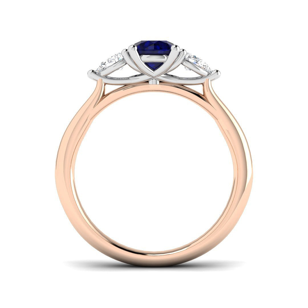 Round Blue Sapphire Three Stone Ring in 10K/14K gold and platinum with certified lab-grown or natural diamonds