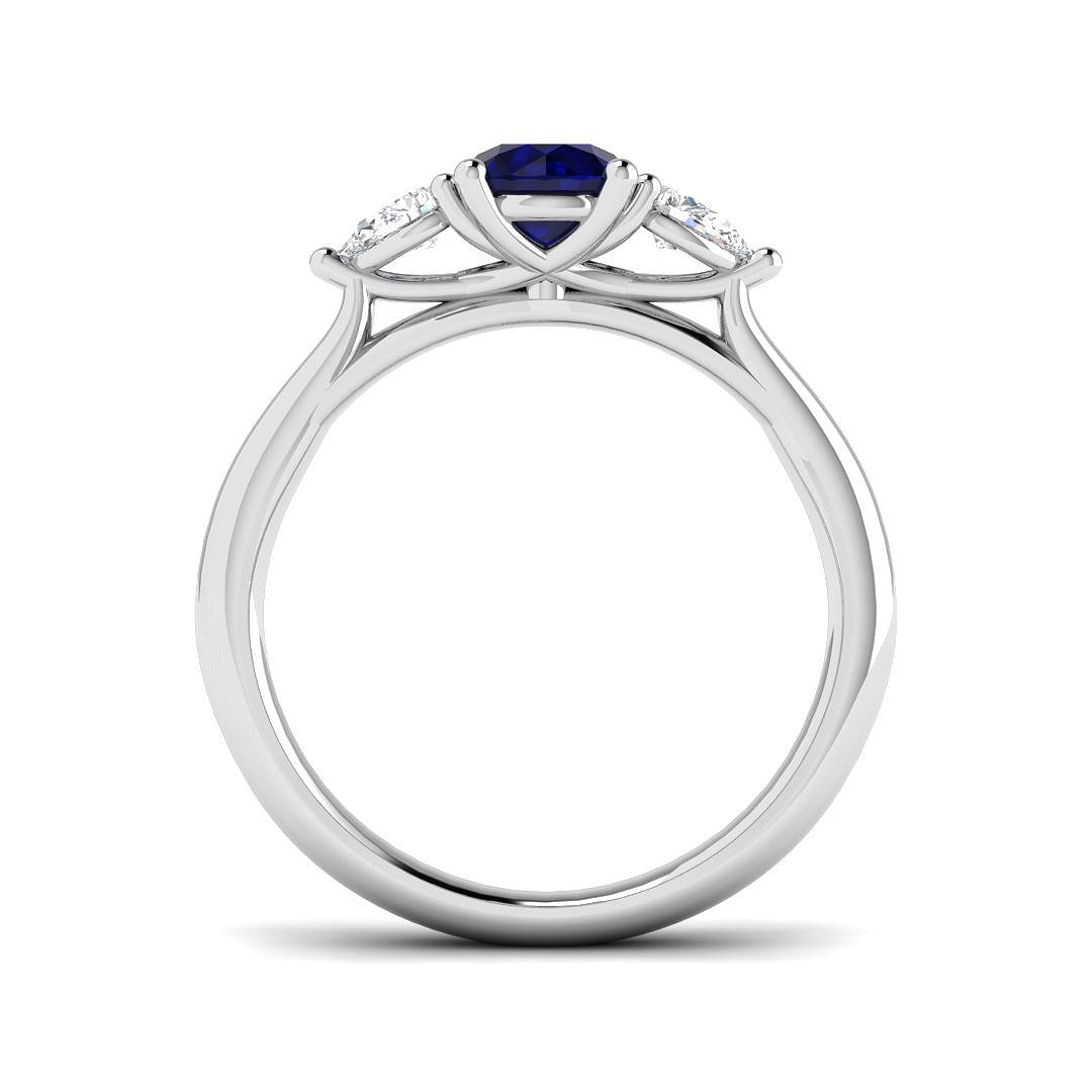 Round Blue Sapphire Three Stone Ring in 10K/14K gold and platinum with certified lab-grown or natural diamonds