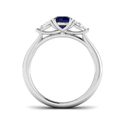 Round Blue Sapphire Three Stone Ring in 10K/14K gold and platinum with certified lab-grown or natural diamonds